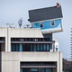 Image for article titled There Is a House Sprouting From Atop This 7-Story Building